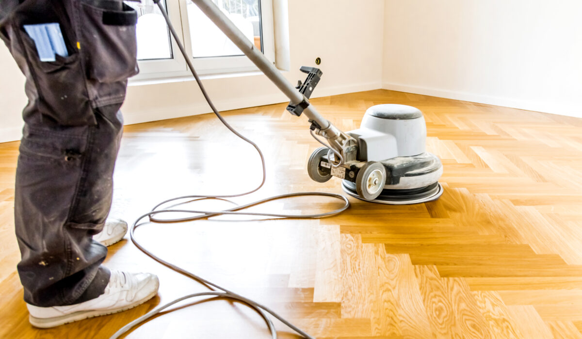 Varnishing,Of,Oak,Parquet,Floor,,Workers,Hand,And,Tool